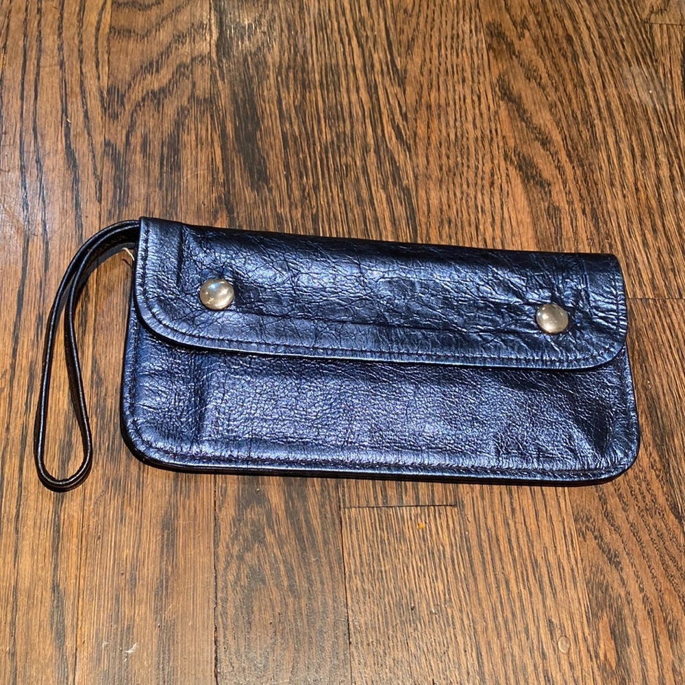 Not Rational wristlet purse new condition in metallic blue